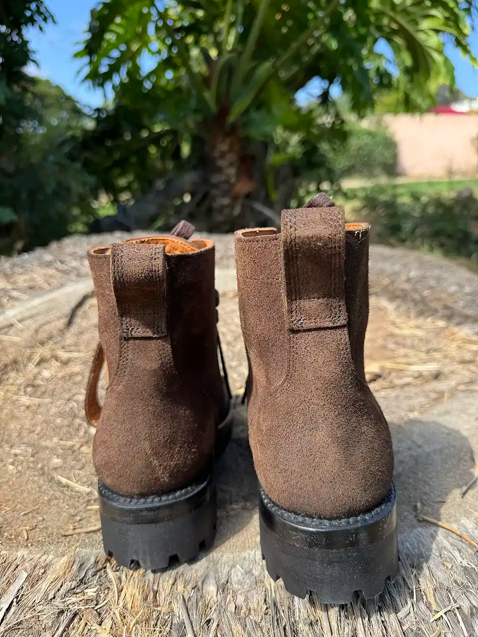 Botas Hasta La Muerte brown roughout leather lace up boots with Goodyear welt and lug soles handcrafted in León Mexico.