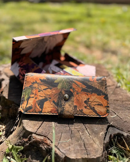 Botas Hasta La Muerte camouflage cowhide leather trucker wallet with brass snap closure handcrafted in León Mexico.