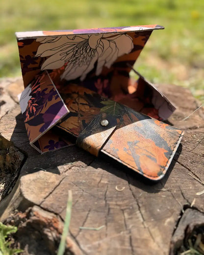 Botas Hasta La Muerte camouflage cowhide leather trucker wallet with brass snap closure handcrafted in León Mexico.