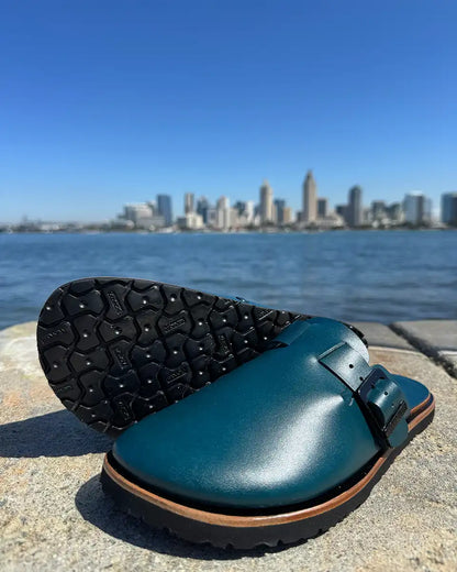 Botas Hasta La Muerte teal vegetable tanned zero drop clogs with Vibram rubber soles handcrafted in León Mexico.