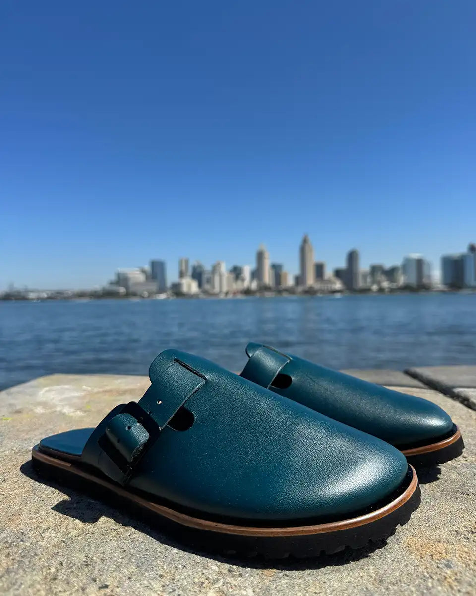 Botas Hasta La Muerte teal vegetable tanned zero drop clogs with Vibram rubber soles handcrafted in León Mexico.