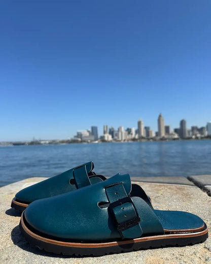 Botas Hasta La Muerte teal vegetable tanned zero drop clogs with Vibram rubber soles handcrafted in León Mexico.