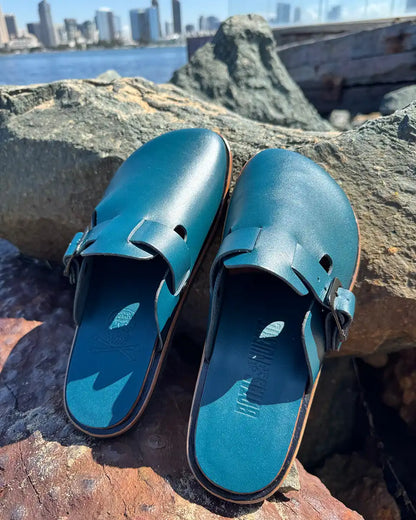 Botas Hasta La Muerte teal vegetable tanned zero drop clogs with Vibram rubber soles handcrafted in León Mexico.