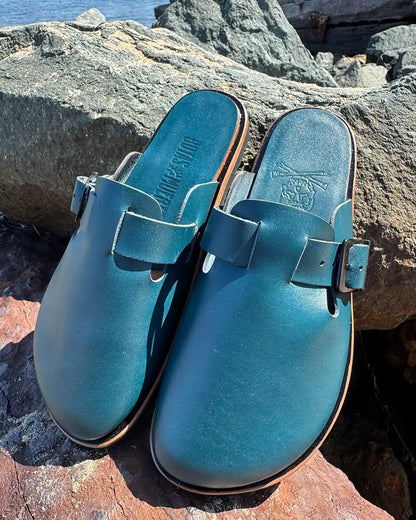 Botas Hasta La Muerte teal vegetable tanned zero drop clogs with Vibram rubber soles handcrafted in León Mexico.