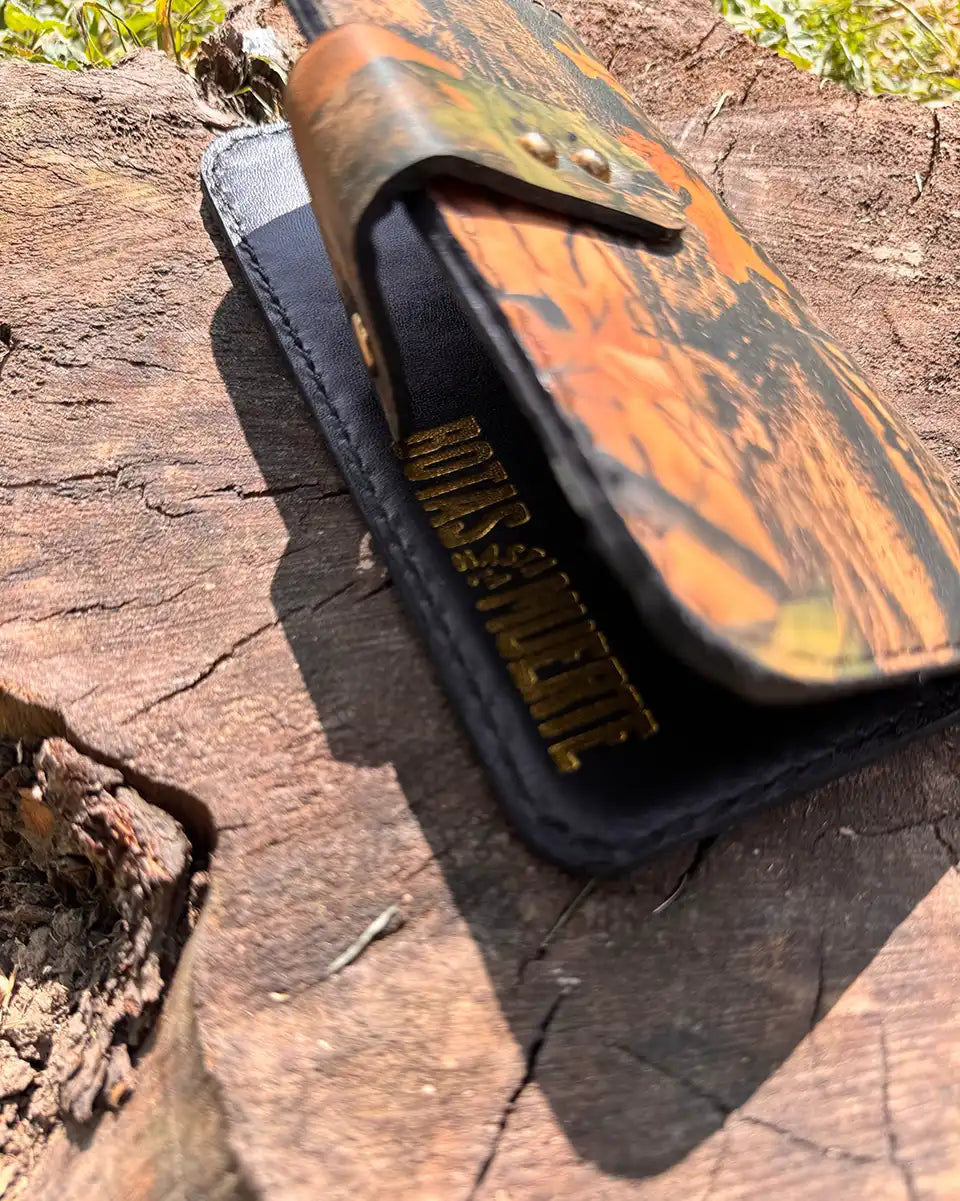 Botas Hasta La Muerte camouflage cowhide leather trucker wallet with brass snap closure handcrafted in León Mexico.