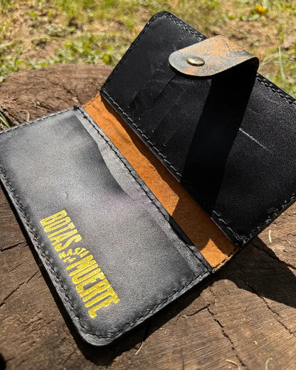 Botas Hasta La Muerte camouflage cowhide leather trucker wallet with brass snap closure handcrafted in León Mexico.