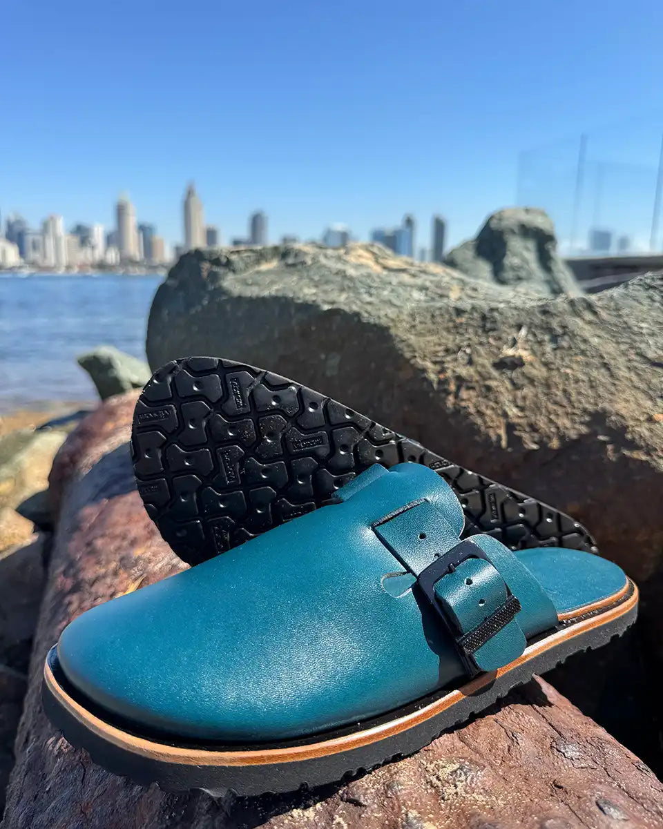 Botas Hasta La Muerte teal vegetable tanned zero drop clogs with Vibram rubber soles handcrafted in León Mexico.